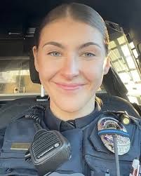 officers help with flat tire change