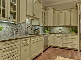 White And Gray Kitchen With Moroccan Tile Backsplash And Chrome Pendants Description From Pinterest Beige Kitchen Green Kitchen Cabinets Green Kitchen Designs