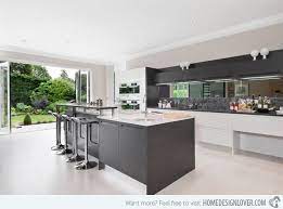 These spaces might have grey kitchen cabinets or grey kitchen tiles, but either way, we like them. 15 Lovely Open Kitchen Designs Home Design Lover Grey Kitchen Designs Kitchen Design Open Kitchen Design