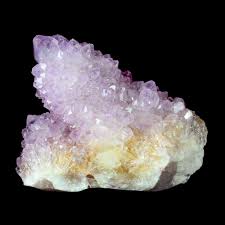 Fairy quartz is a fledgling spirit quartz, from south africa, showing the milky white lazer wand point and a light coating of smaller crystals growing on it. Spirit Quartz