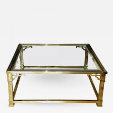 The beveled glass top has beautifully curved edges, sits on top of 4 solid. Mastercraft Vintage Mastercraft Polished Brass And Beveled Glass Coffee Table