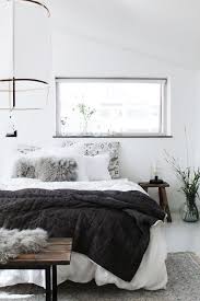 The concept of hygge seems specially tailored for bedrooms. 15 Best Scandinavian Tips To Create A Cozy Home Bedroom Inspiration White Scandinavian Design Bedroom Bedroom Design Trends