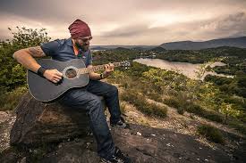 Hd Wallpaper Man Playing Black Acoustic Guitar Sitting On Rock Guitarist Wallpaper Flare Guitar player stock vectors, clipart and illustrations. man playing black acoustic guitar