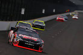 Indianapolis kevin harvick turned up the heat on denny hamlin late in the brickyard 400. Pgtwpaf1df Bxm