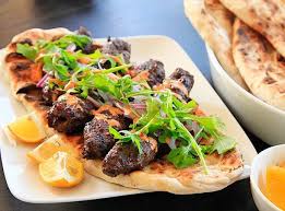 Kofte Kebabs With Spicy Harissa Yogurt Sauce And Grilled Flatbread Minced Lamb Kebabs Recipe Recipe Lamb Kebabs Kebab Recipes Kebab