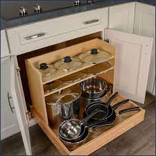 Base cabinets give you storage underneath the countertops in your kitchen and are great for storing heavy items like pots and pans. Top 5 Recommended Kitchen Cabinets For Organizing Pots Pans And Lids