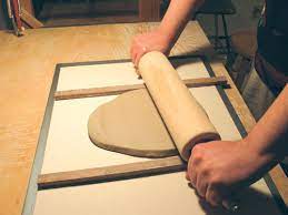 Mop the tile floor to disinfect it. Flat Tiles The Easy Way Ceramic Arts Network