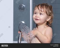 How often should they do it? Child Bathing Under Image Photo Free Trial Bigstock