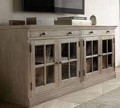 An open shelf leaves space for curated decorating, while a cord cutout and drawers keep your tech devices out of sight. Livingston Double Glass Door Cabinet Potterybarn Tv Stand With Glass Doors Small Tv Stand Tv Stand Pottery Barn