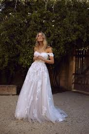 Long Blonde Wavy Hair White Dress Made Of Lace And Tulle Off The Shoulder Neckline Beac Lace Beach Wedding Dress Off Shoulder Wedding Dress Wedding Dresses