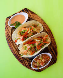 Place warm corn tortilla down on the plate. Try Our New Baja Fish Tacos Served Dodgy Dock Grenada Facebook
