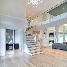 Open Floor Plan And Glass Railing By Studio Ten Interior Design Foyer Dreamhome Glassstaircase Stairs In Living Room Staircase Design House Design