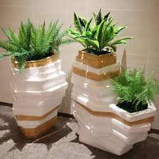A succulent is any plant that has a thick, fleshy water storage capability. China H113 Fiberglass Waves Shape Flower Pots For Sale Large Resin Flower Pots Decorative Flower Pots China Waves Shape Flower Pots For Sale And Large Resin Flower Pots Price