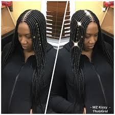 Angled cornrow with braided parts. Middle Part Feeders Braided Hairstyles Braid Styles Feeder Braids