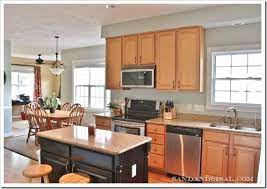 We have lots of kitchen color ideas with maple cabinets for people to optfor. Comfort Gray Kitchen Sand And Sisal Grey Kitchen Walls Honey Oak Cabinets Kitchen Wall Colors