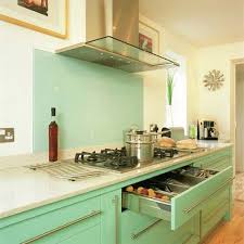 A Modern Kitchen With A Retro Color Palette Retro Kitchen Mint Green Kitchen Modern Kitchen