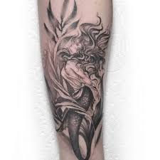 Mermaid bachelorette party tattoos | mermaid squad, trading my tail for a veil, time to party our tails off, last splash, beach bach, favors. Top 55 Best Mermaid Tattoo Ideas 2021 Inspiration Guide