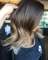 Her hair color flows from a dark, almost reddish brown to flecks of russet, giving her look a quirky and contemporary edge. 37 Hottest Ombre Hair Color Ideas Of 2020