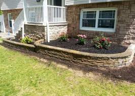 4 In X 12 In X 7 5 In Charcoal Tan Concrete Retaining Wall Block 86935 The Home Depot Concrete Retaining Walls Front Yard Landscaping Landscape Pavers