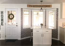 Learn how i whitewash brick and see how dramatic of an impact it makes in the room. How To Add Faux Brick Wall Using A Stencil Dream Design Diy