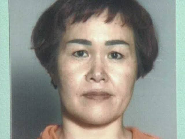 逮捕後の福田和子元受刑者（AI 生成）