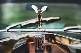 Rolls royce was known to attract an audience whose age varies between the 50s, but in recent researches, they found that the average age of their. Silver Rolls Royce Emblem Photo Free Mont Saint Aignan Image On Unsplash