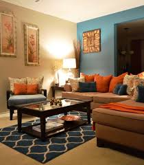 You are viewing image #18 of 21, you can see the complete gallery at the bottom below. Living Room Orange And Brown Teal Art Gallery Wall By Carolyncochrane Turquoise Beautifules On Li Living Room Orange Brown Living Room Burnt Orange Living Room
