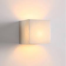 This stylish light illuminates from both the top and the bottom providing an ample amount of illumination. Cubo Outdoor Led Up Down Wall Light S M Natural Alabaster Square 5w The Lighting Outlet