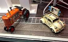 Yellow metal kitchen set antique toy cars. Tin Toy Wikipedia