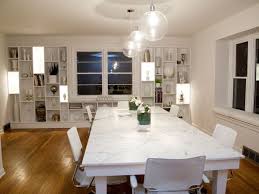 A Custom Designed 10 Foot Table With A Carrera Marble Top Fills This Room A Custom Designed Dining Room Contemporary Dining Room Design Dining Room Lighting