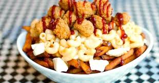 Add your fried or baked fries to a large, clean bowl. The World S Biggest Poutine Festival Is Returning To Cities Across Canada Narcity