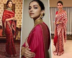 This chiffon saree features one of the best combinations of colours using red, pink on the pastel green background. 7 Times Deepika Padukone Left Us Spellbound In Silk Sarees