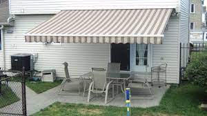 Retractable Awning All Awnings Are Custom Made To Fit Your Needs By South Coast Awning The Fabric Selectio Aluminum Awnings Outdoor Fabric Retractable Awning