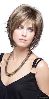 Frame your face perfectly with layers and a wispy long bangs that can help narrow your face shape. Pin On Hairstyles