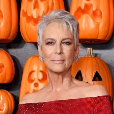 Halloween's Jamie Lee Curtis sizzles in low-cut swimsuit and fishnet tights  for poolside photos