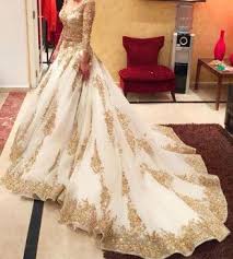 For more cream and gold bridal style inspiration, head over to see ashleigh and stasi's wedding in johannesburg, south africa. Majestic Golden And Cream Bridal Lehenga Gold Lace Wedding Dress Gowns Indian Wedding Dress