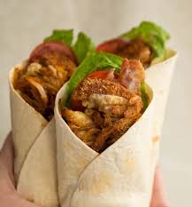 The Chicken In These Wraps Are Coated In A Crispy Breadcrumb And Seasoned In A Southern Fried Style Th Crispy Chicken Wraps Chicken Wraps Chicken Wrap Recipes
