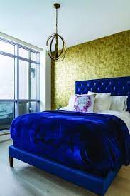 Spxtex navy blue velvet curtains 108 inches long sliding door curtains for living room royal blue velvet curtains grommet heavy velvet drapes thermal insulated curtains for bedroom set of 1 panel 4.5 out of 5 stars 206 Royal Blue Bedding Matches The Tufted Headboard Gold Wallpaper Adds To The Regal Sleeping Quar Blue Bedroom Decor Blue And Gold Living Room Royal Blue Bedding