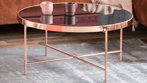 If your room is small or cramped, a glass coffee table will help open it up with style. Rwt8 O6vazs9 M