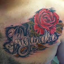 A banner with the name of a beloved one. Rose Tattoo With Name