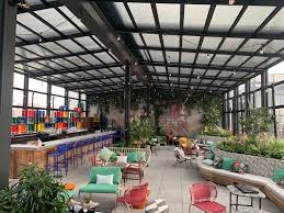 moxy east village retractable roof manufactured by roll a cover patio enclosures retractable roof patio roof