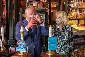 Prince Charles sips his first beer at ...