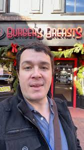 Mayor Phil Dague begins the No Kings protest organized by Indivisible  Chester County in West Chester, PA. After talking about the goals of the  day, he introduces Rev. Josh Gill, a local