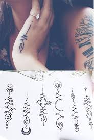 8 Unique And Inspiring Yoga Tattoos Their Meaning Unalome Tattoo Tattoos Hand Tattoos