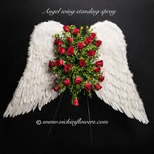 When should you not send a standing spray is a design that stands upright, typically supported on an easel or lent against the casket. Funeral Crosses Standing Sprays Vickies Flowers Brighton Co Florist
