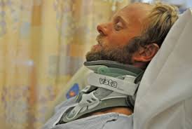 Pastor nearly paralyzed in surfing accident