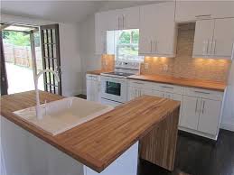 Modern Butcher Block Kitchen In East Nashville Remodeled House Could Wrap The Island Modern Kitchen Design Butcher Block Countertops Modern Kitchen