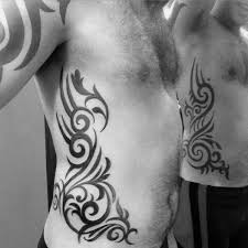 Flower tattoo design on ribs. Top 40 Best Tribal Rib Tattoos For Men Manly Ink Design Ideas