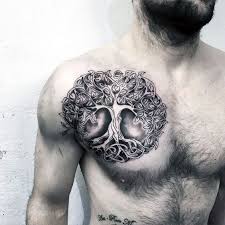 Wells sioux caught in the webb of a colorfully beaded blue and pink, yellow, green and red dreamcatcher. 30 Best Tree Of Life Tattoo Designs And Ideas Entertainmentmesh