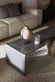 en wat vinden jullie van onze nieuwe salontafel van staal de hoeken zijn in een perfecte bocht gebogen tegel woonkamer inspiratie design woonkamers wabi sabi